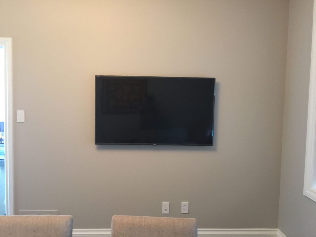 TV wall mount installation with in ceiling speakers