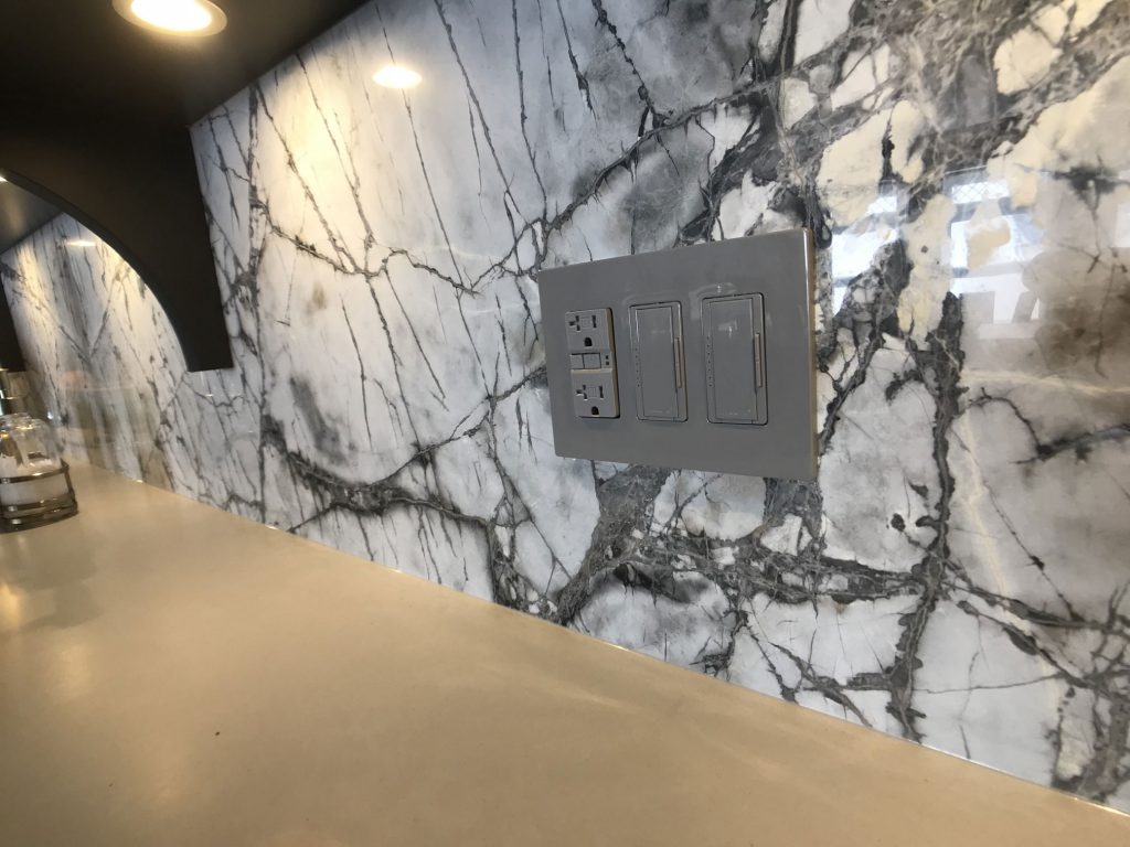 Lutron lighting control dimmers with coordinating wallplate