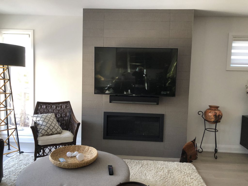 TV and Sonos Playbar mounted on tile